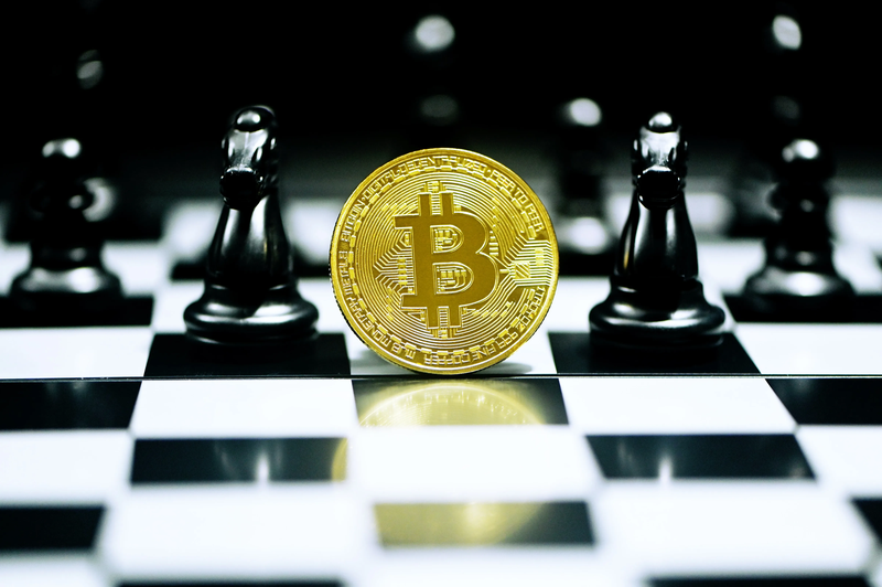 bitcoin on a chess board