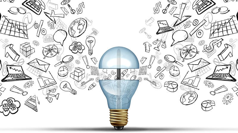 lightbulb surrounded by sketches