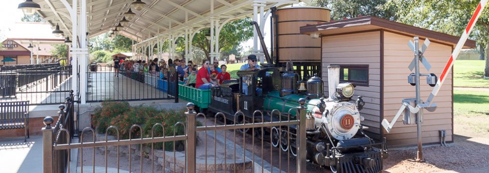 Riders aboard the McCormick Stillman Railroad miniature train wait for departure.