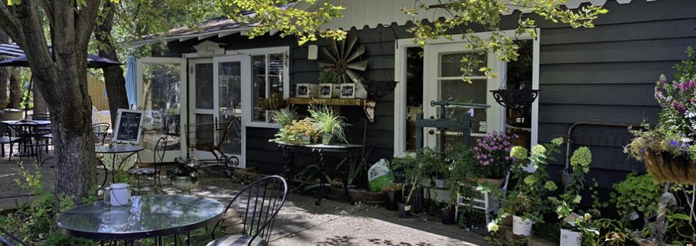 A shaded patio signals the entrance to The Bistro at Annie