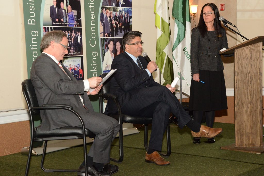 Counsellor Tom Gill, Chair of Surrey’s Finance Committee as well as Transportation & Infrastructure, and Ken Peacock, of the Business Council of BC, taking audience questions, moderated by Board of Trade Chair, Shelley Besse. Photo: Ray Hudson