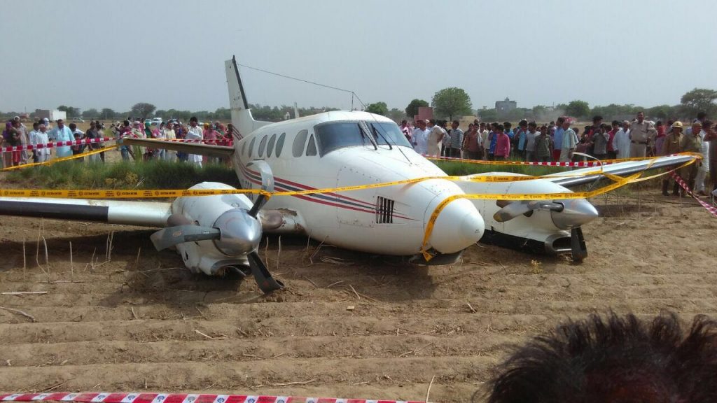 New Delhi: The air ambulance that crash landed in Kair village of Najafgarh in south Delhi on May 24, 2016. Seven people were on board. (Photo: IANS)