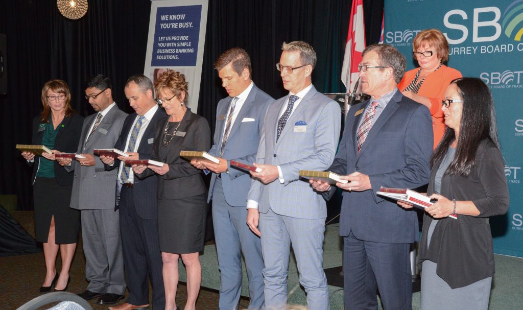 The newly elected and re-elected Directors Surrey Board of Trade for 2016-2017 were sworn in by Mayor Linda Hepner. From left, Tammy Rae TD Bank, Jay Rao WSP Canada Inc, John Folka KPMG, Marlyn Graziano KPU, Chuck Keeling Elements Casino, Dr. Greg Thomas G3 Consulting and New Chair, Richard Dendy A&A Contract Customs Brokers, and Immediate Past Chair Shelley Besse nFirst West Credit Union.