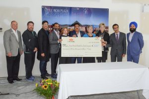 Cheque presentation, from left, Councillors Dave Woods, Mike Starchuk, Tom Gill, Iqbal Grewal, Mayor Linda Hepner, Jay Minhas, Yoland Bauwman, Councillor Mary Martin, Kulwinder Sanghera and Gurdev Sandhu. 