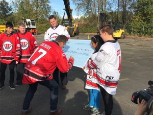 2 Casey McCawley FGT_signs 150K donation cheque