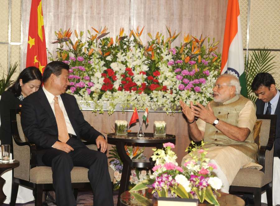 Prime Minister Narendra Modi and Chinese President Xi Jinping during a meeting in Ahmedabad, Gujarat on September 17, 2014. (Photo: IANS/PIB)