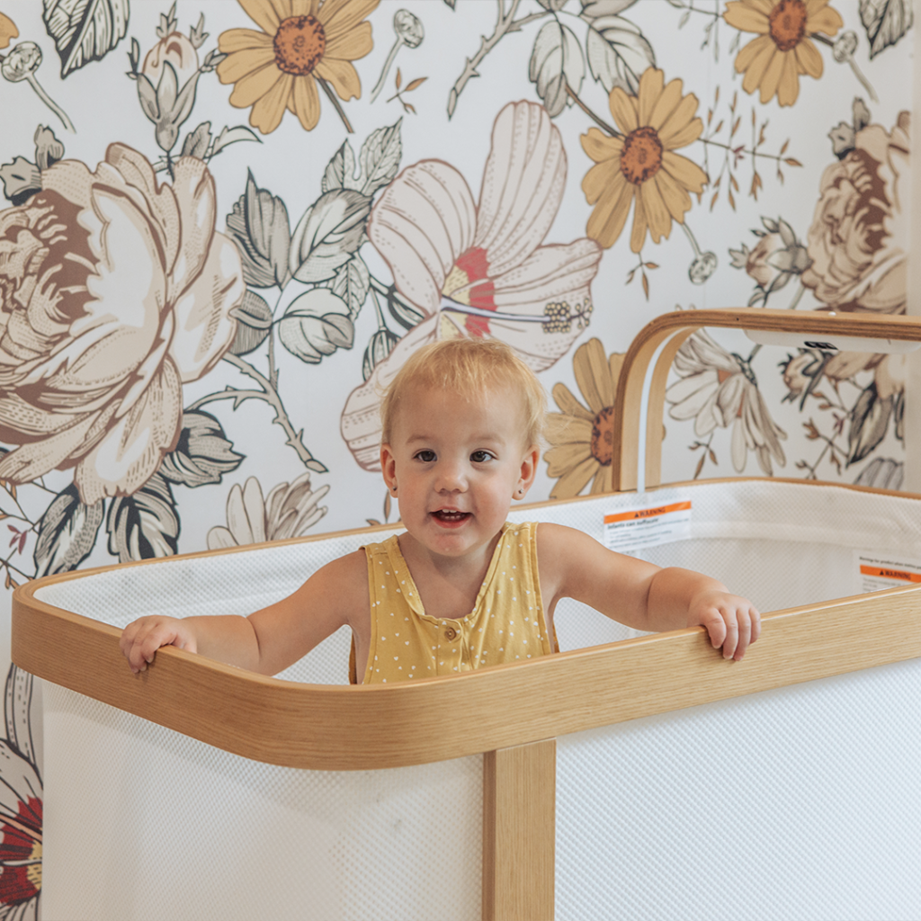 Baby playing their crib