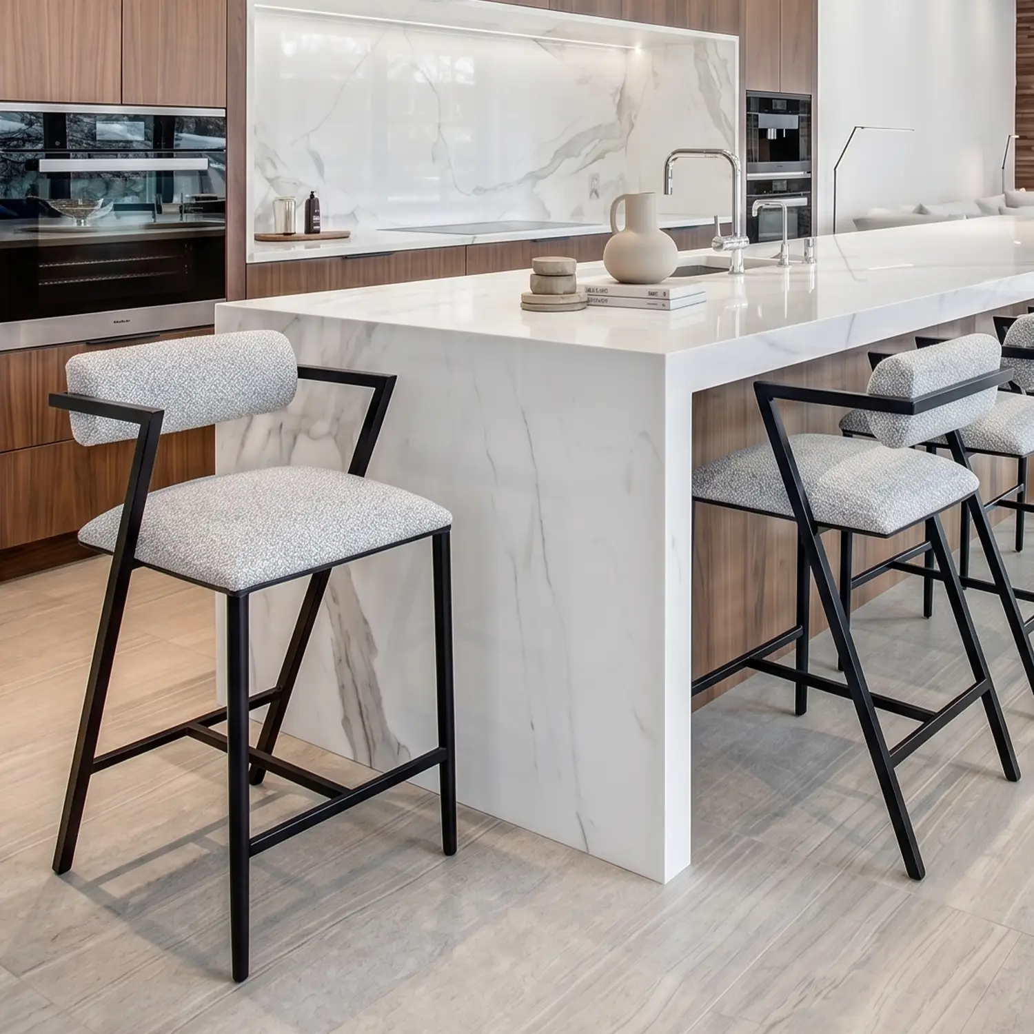 Solaris shown in Matte Black Finish with Zen Dawn Performance Fabric. Shown in a modern kitchen lifestyle image.