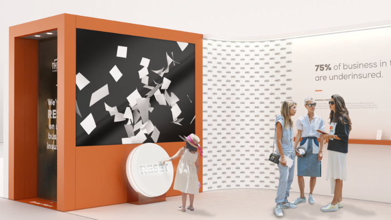 Trade show booth rendering with giant reset button