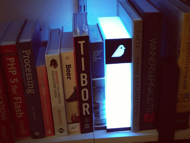 illuminated glowing book on shelf