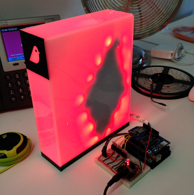 lit up odobook from the side showing exposed arduino powering internal lights