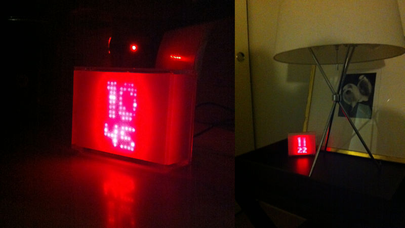 red glowing led matrix clock in white plastic case