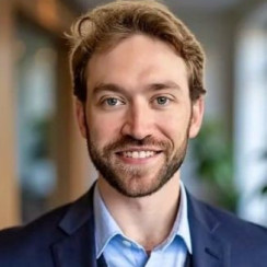 Alex Buscher, Esq.