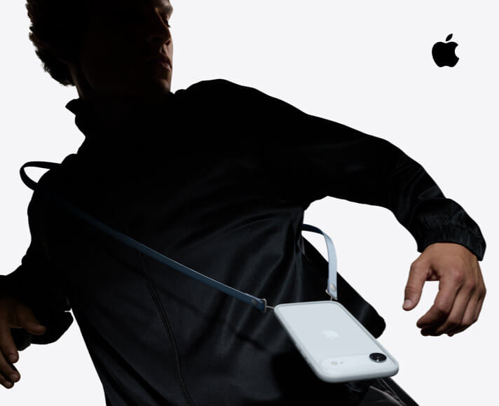 Person wearing iPhone Air, Sky Blue color, with iPhone Air Bumper attached, and blue Crossbody Strap attached, worn around their shoulder