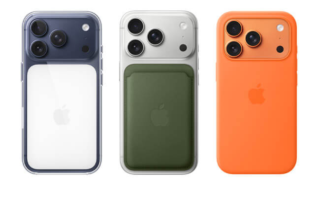 Side-by-side, 3 iPhone 17 models, back exterior view, left to right, in Deep Blue finish inside Clear Case, in Silver finish with green MagSafe wallet attached, in Cosmic Orange finish, inside Orange Silicone Case