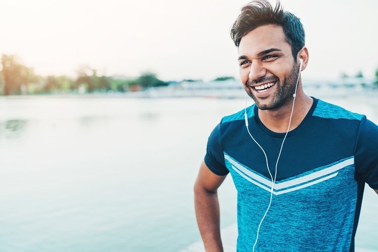 Male smiling on the beach mtime20190430220047focalnone