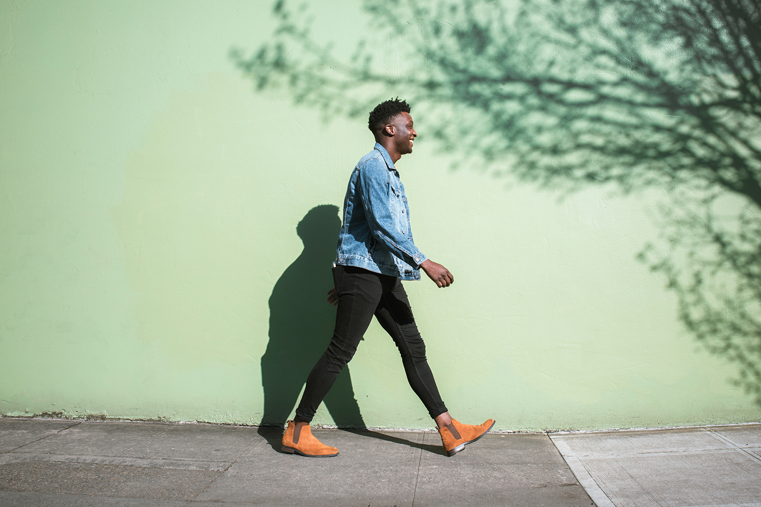 Male walking with a smile