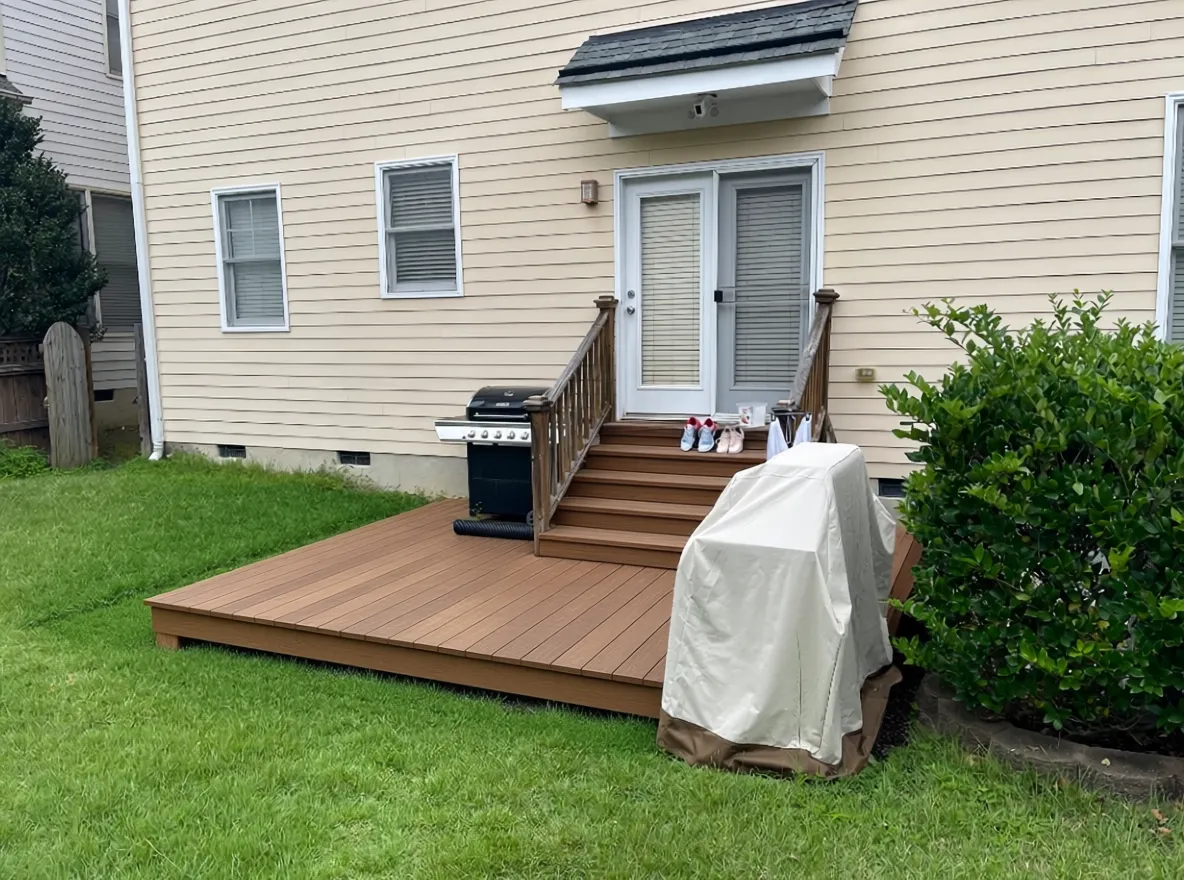 After - studio transformation: I want to hace a big beautiful wooden deck at the same level of the back door. Remove the stairs