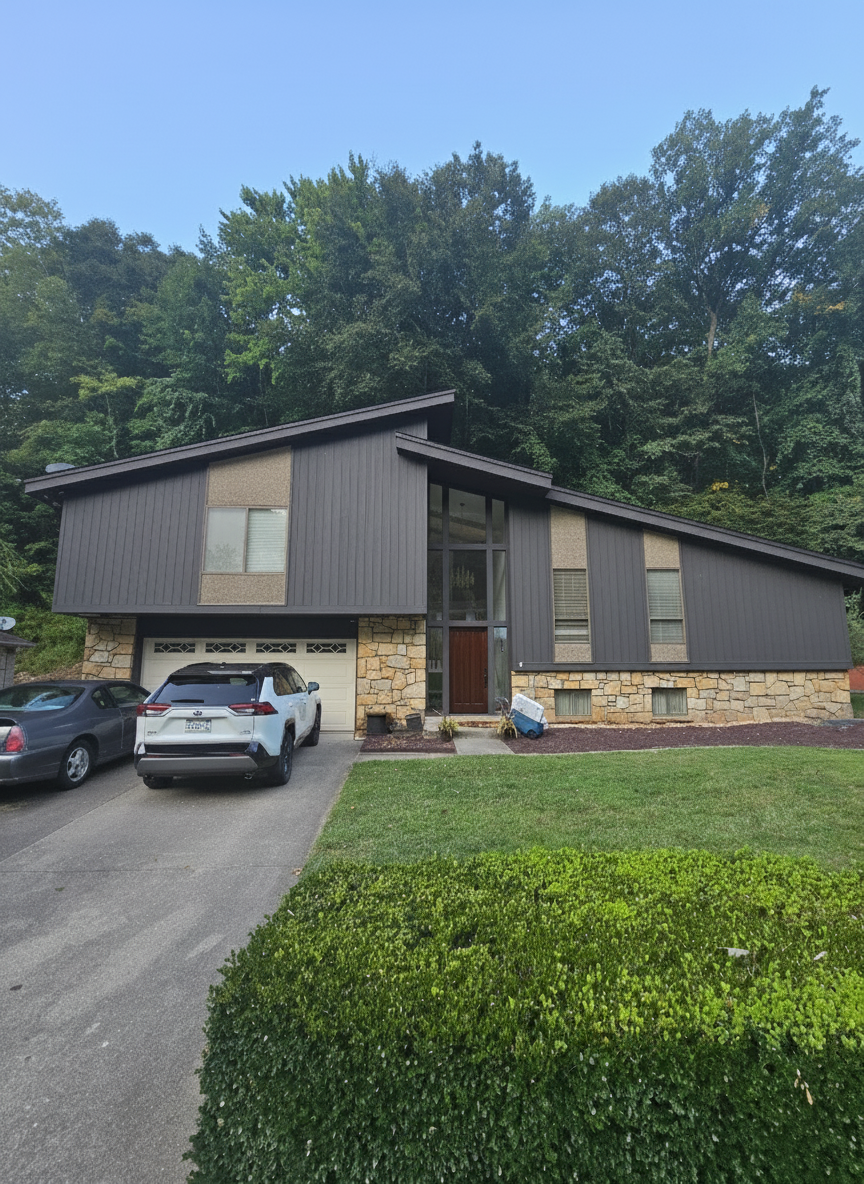 After - exterior transformation: Change to vertical siding and use colors that complement the door and stone