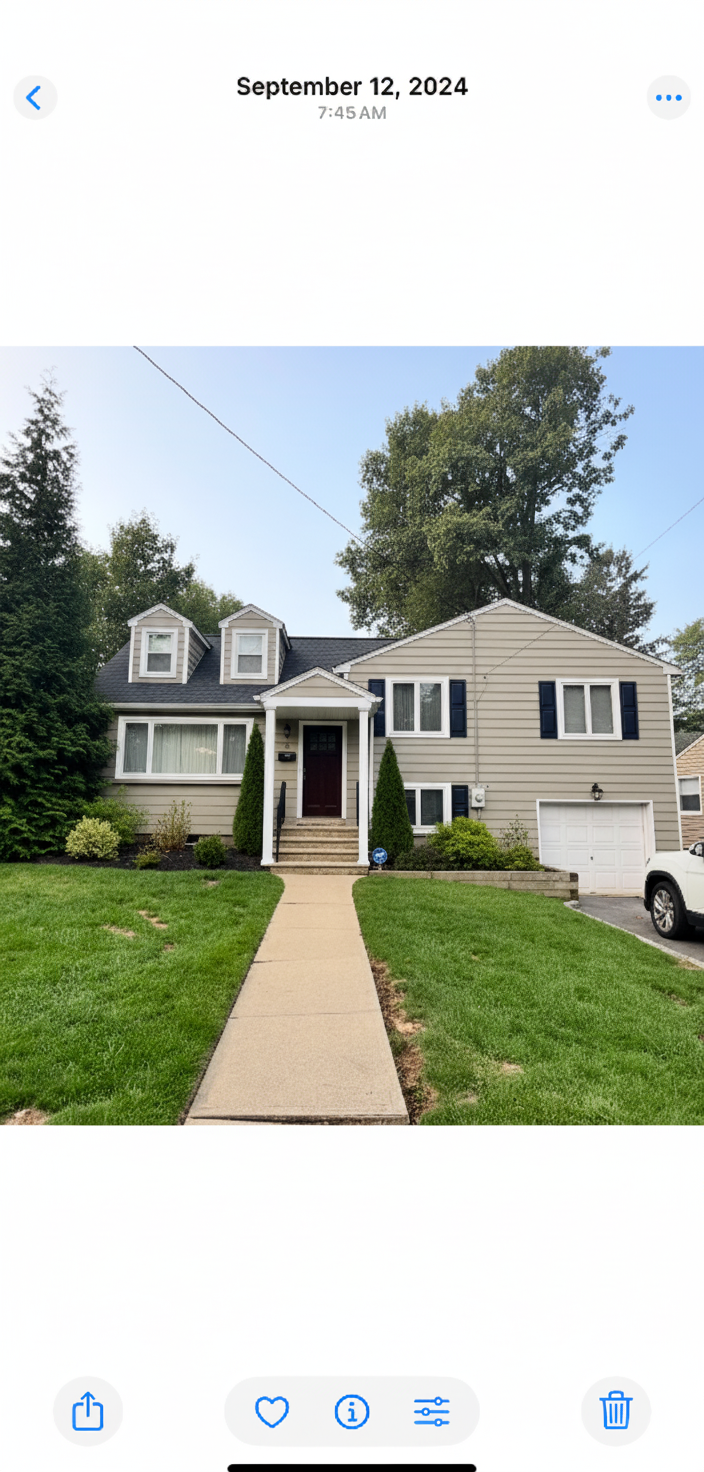 After - interior transformation: Make the house light greige (warm tone) with navy shutters a portico and dormers on the left side.