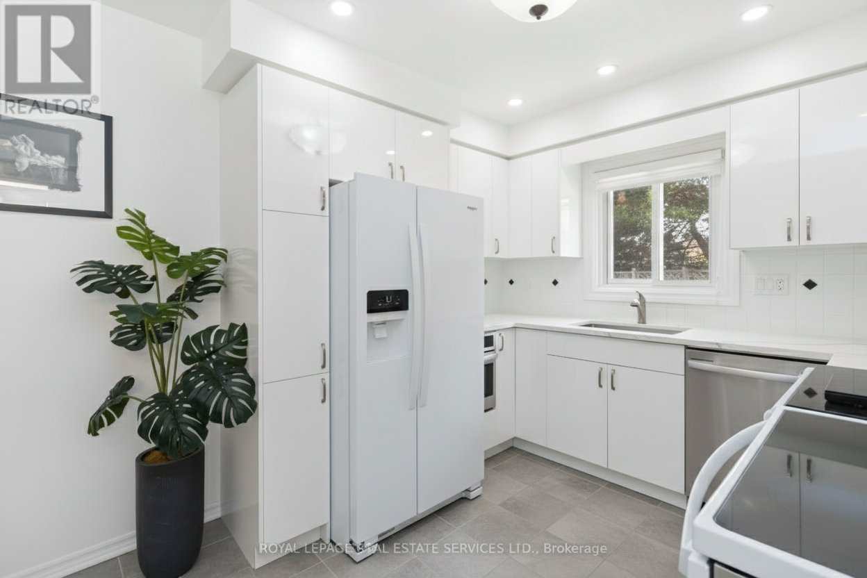 After - interior transformation: Design type: interior. Style Ref: None. Instructions: renovate this kitchen with potlights, new cabinets, white in color, change flooring, applicances, show new design