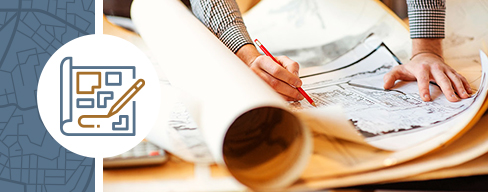 Icon of building plans with an aerial view of a residential cul-de-sac with homes