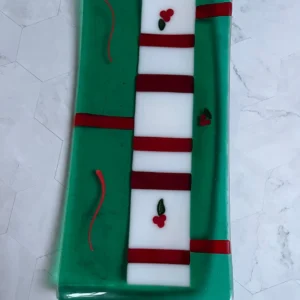 Christmas Tray – transparent green with red stripes and holly accents 14″ x 6.5″ - Fused Glass