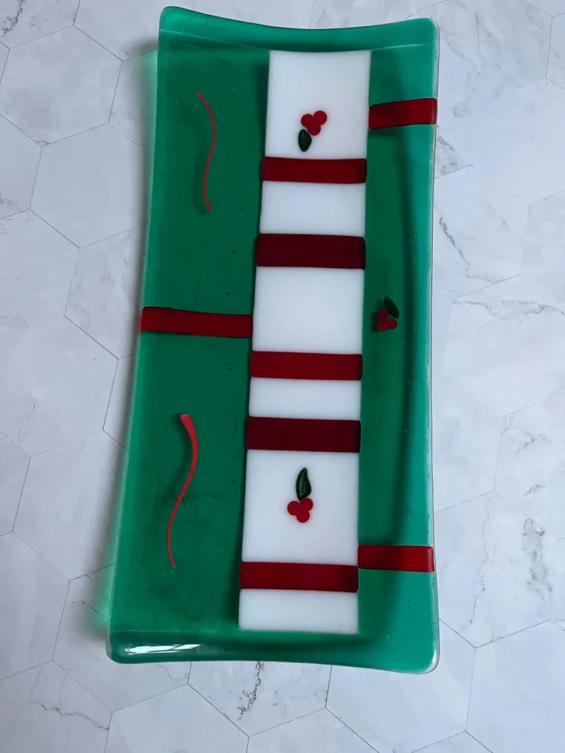 Christmas Tray – transparent green with red stripes and holly accents 14″ x 6.5″ - Fused Glass