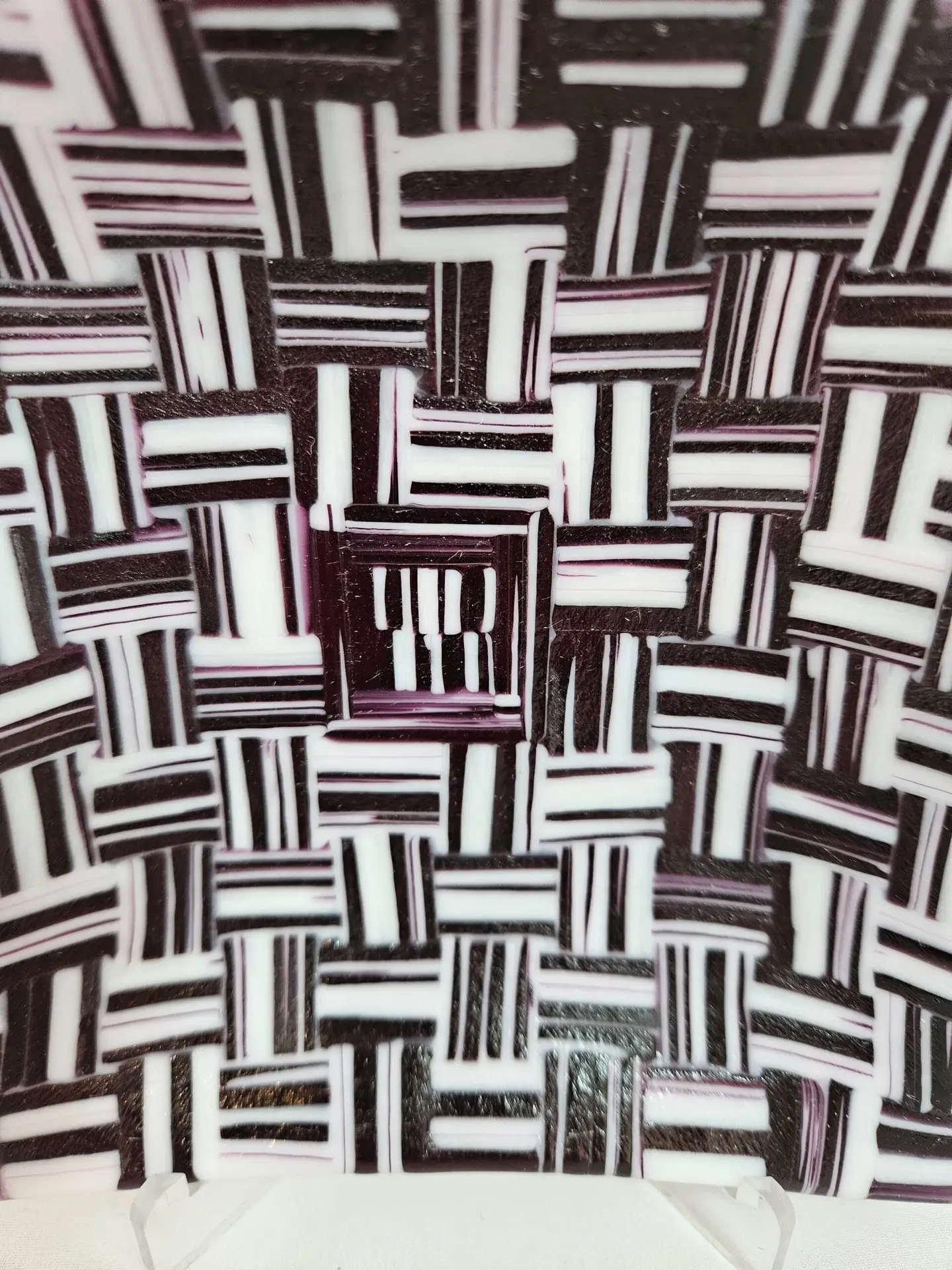 Additional view of Woven Illusions black white and plum fused glass dish