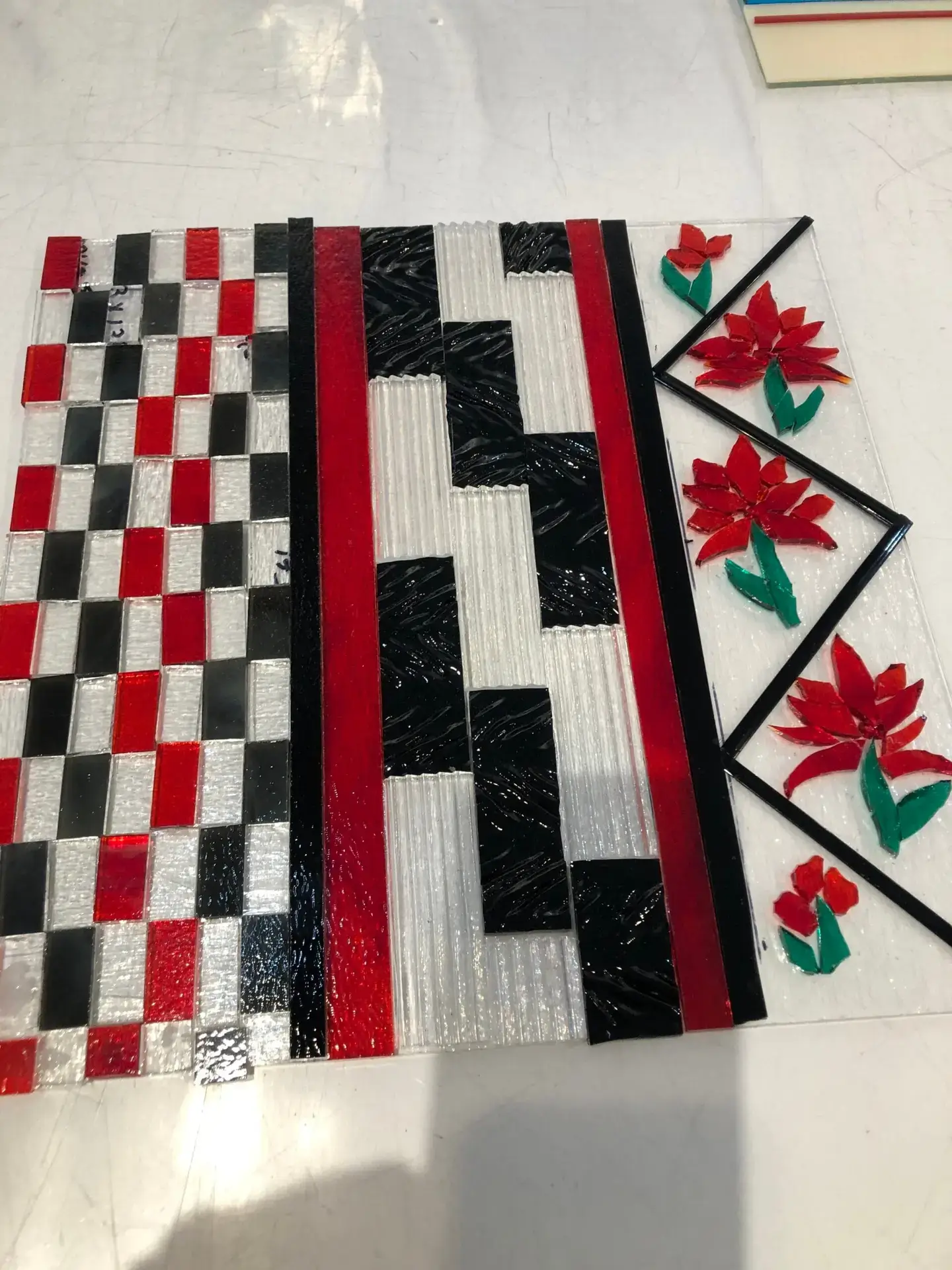 Table Decor is dancing with Red, Black and White. Highlighted by Red Flowers. - Fused Glass