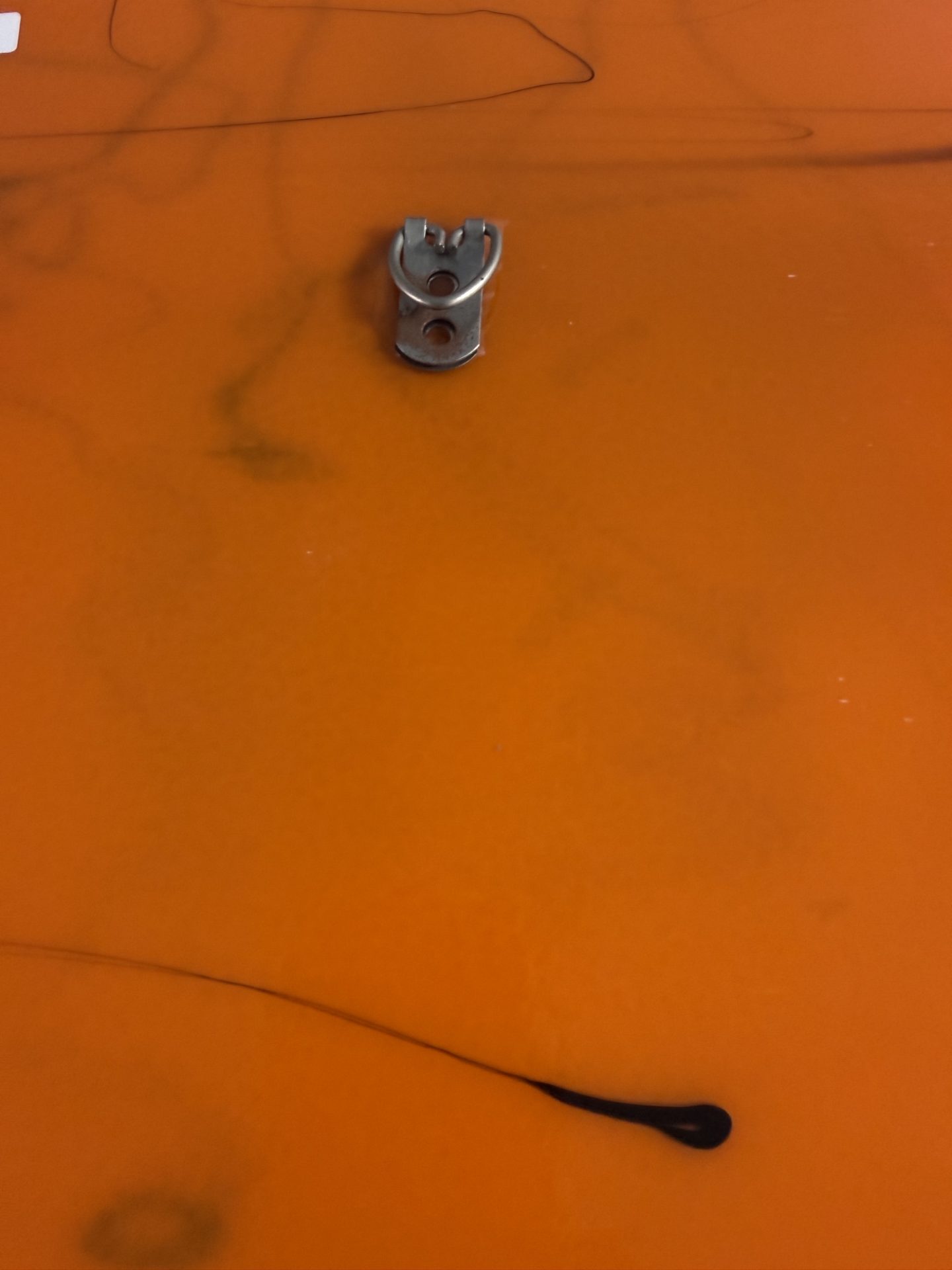 There's a hook for hanging on the back.