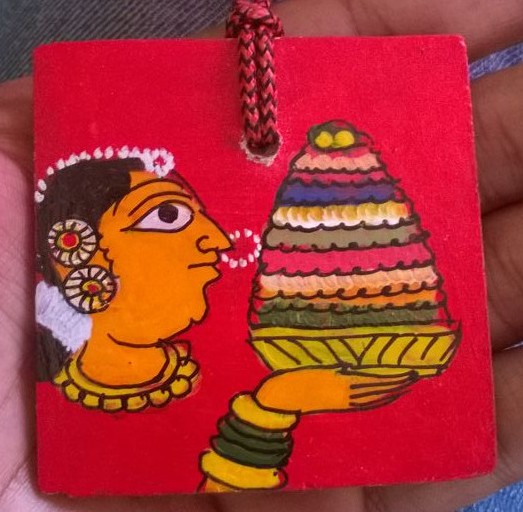 Medal with Bathukamma in Cheriyal Painting, final design will have event name as well