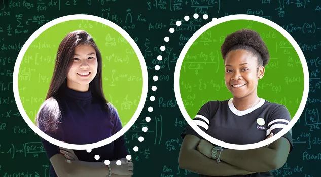 girl in black shirt with tutor and math chalkboard behind hi