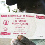 Zimbabwe lops zeros off currency, again