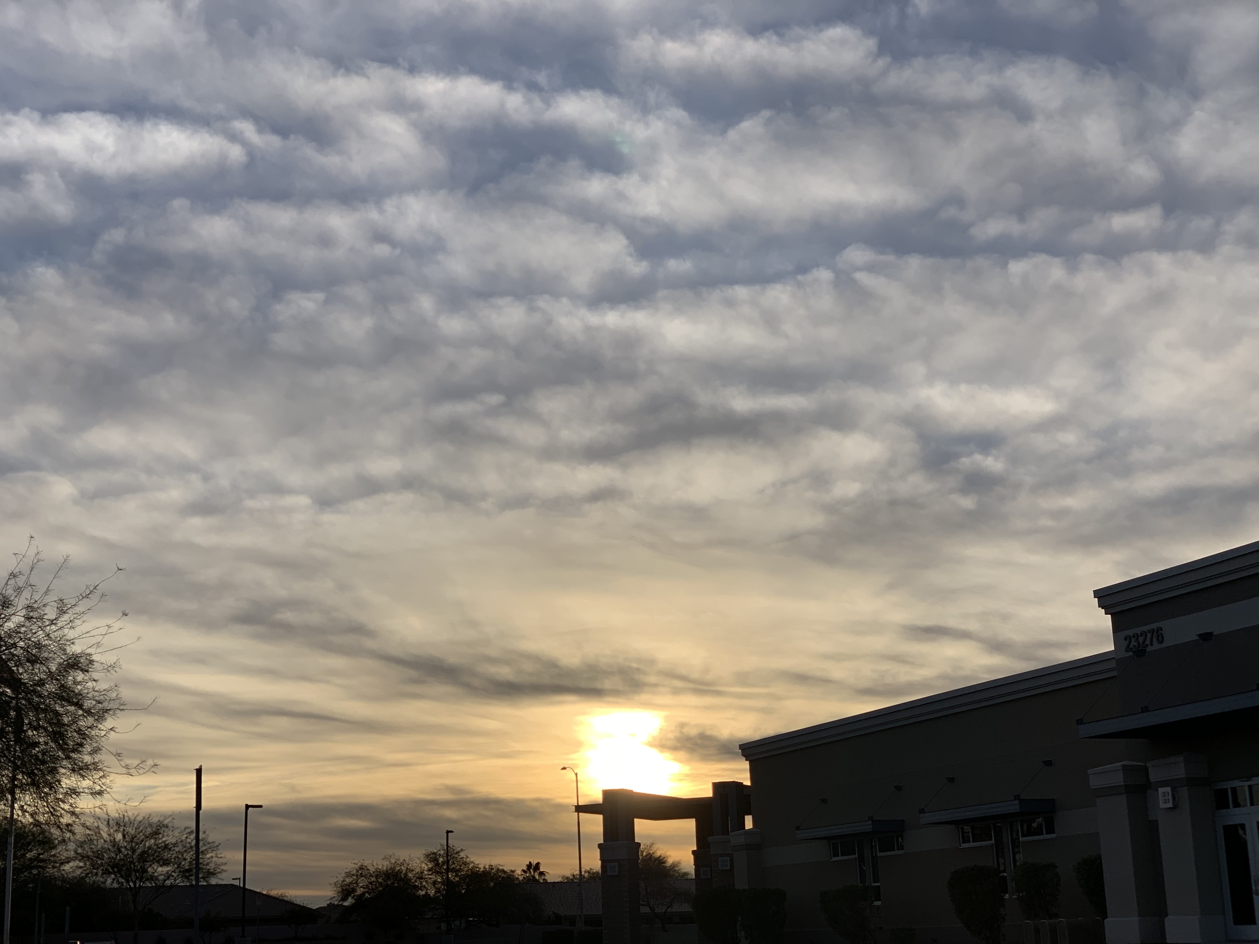 Picture of a cloudy sunrise.