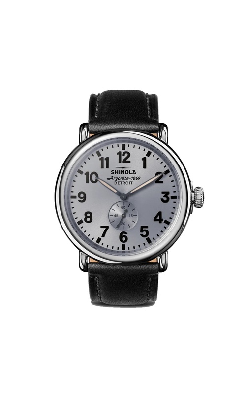 Shinola, Stainless Steel 47mm Runwell Quartz Watch. Featuring a Silver Bezel Case, Screw Down Crown, Cool Gray Dial with Glossy Black Arabic Markers and Seconds Subdial. The 24mm Black Leather Strap Has Matching Black Stiching and Stainless Steel Buckle.
