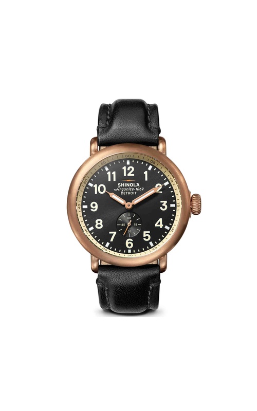 Shinola Bronze Runwell, 43mm Watch With Black Dial. The Dial Has A Seconds Sub-Dial, Bronze Lumen Hands, Arabic Markers. The Case is Satin Finish Bronze with a Matte Finish Leather Watch Strap and Bronze Buckle. S01 014 00294