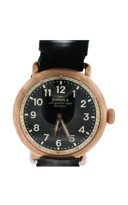 Shinola Bronze Runwell, 43mm Watch With Black Dial. The Dial Has A Seconds Sub-Dial, Bronze Lumen Hands, Arabic Markers. The Case is Satin Finish Bronze with a Matte Finish Leather Watch Strap and Bronze Buckle. S01 014 00294