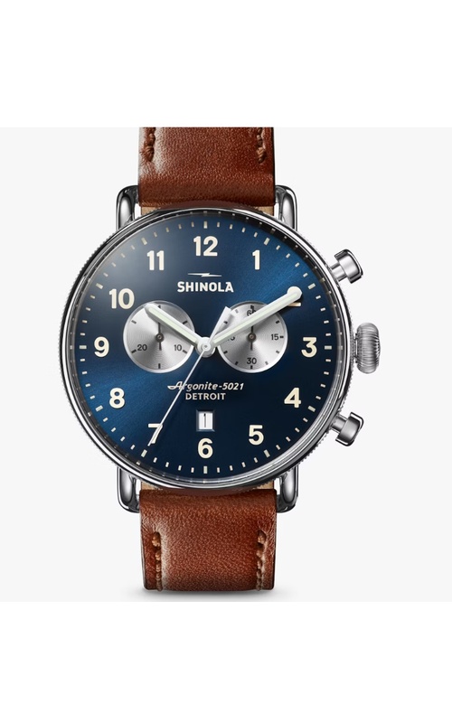 Shinola Watch, Featuring A Midnight Blue Dial, Cream Numbers, Super-LumiNova Hands, Date Function, Within A 43MM High Polish Stainless Steel Case With A Coin Style Side Frame, A Double Curved Sapphire Crystal, Argonite Chronograph Movement, The Signatu re