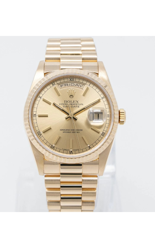 Oyster Perpetual Rolex Day-Date, 18 karat Yellow Gold, 36mm case size, President Bracelet, Yellow Gold Fluted Bezel, Champagne Index Dial, Original Rolex Box Model #18238