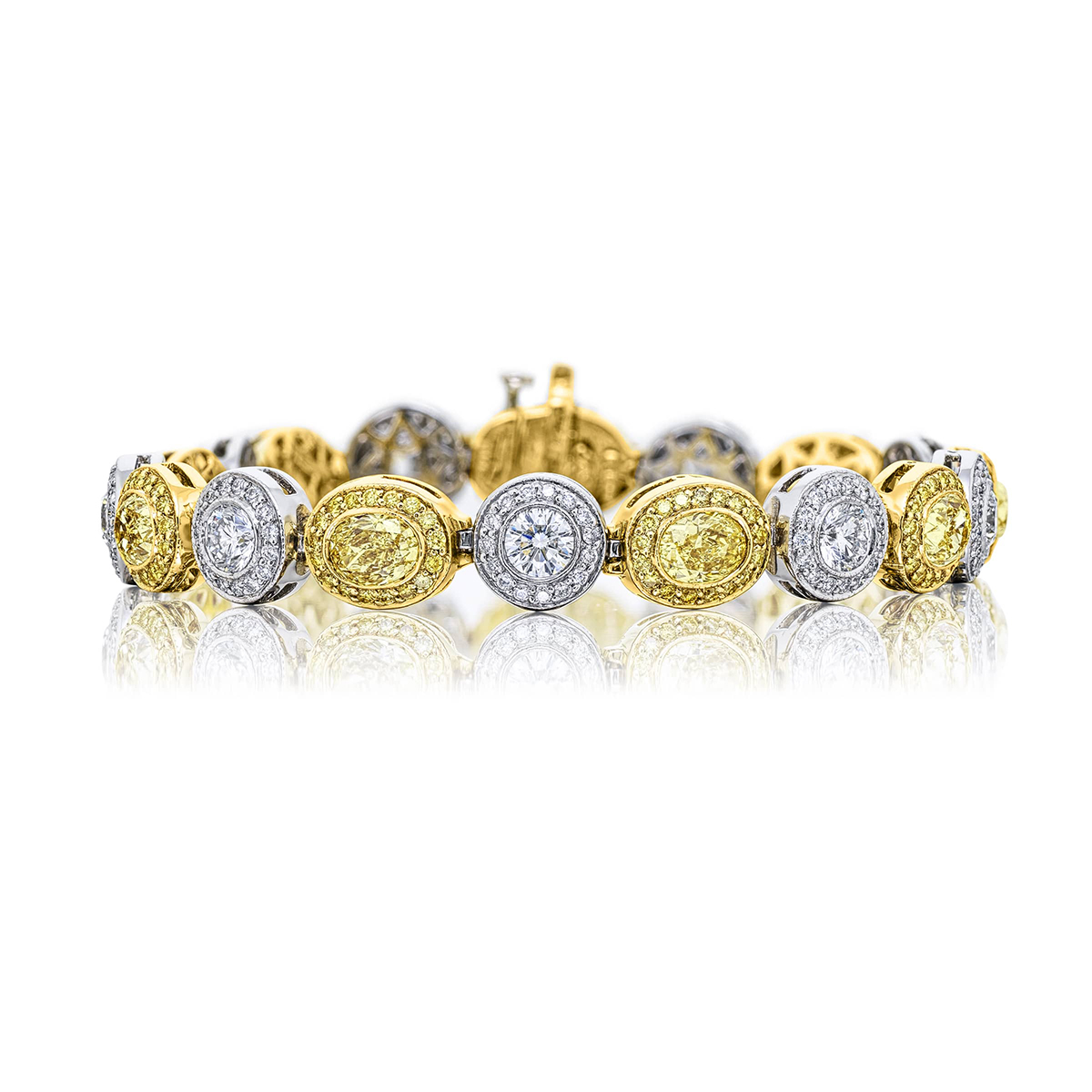 Platinum and 18K Yellow Gold Oval and Round Micro Pave Bracelet