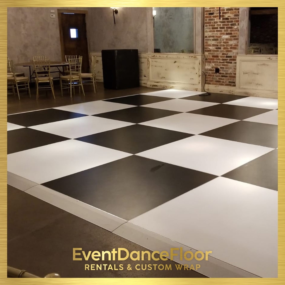 How should one clean a sprung dance floor to maintain its performance quality?