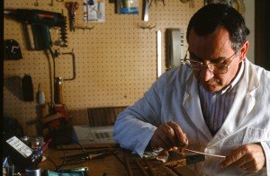 luthier handcrafting a violin bow