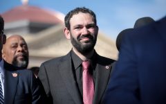 State Representative Alexander Kolodin speaking with the media outside the Arizona State Capitol building on the opening day of the 56th Legislature in Phoenix, Arizona
