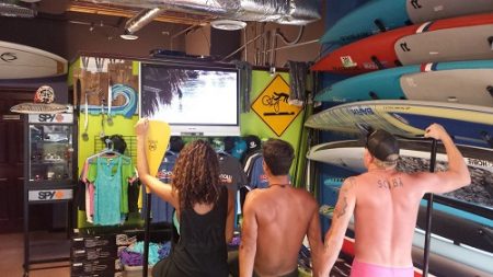 Watching intro to stand up paddle boarding