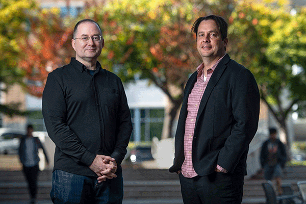 Gregg Macey (left), director of the Center for Land, Environment and Natural Resources at UCI Law, and Alejandro Camacho, a Chancellor’s Professor of law and faculty director of CLEANR