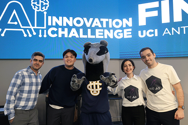 ANTrepreneur Center director Ryan Foland takes a selfie with participants in the AI Innovation Challenge. Angie Delfin / ANTrepreneur Center