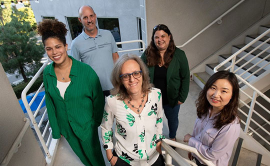 UCI faculty and community partners involved in developing a high school curriculum to inspire teens to consider environmental engineering as a career include (from left) Symone Gyles, assistant professor of education; Brett Sanders, professor of civil and environmental engineering; Rosella Santagata, professor of education; Sara Ludovise of the Orange County Department of Education; and Hosun Kang, associate professor of education. Steve Zylius / UCI