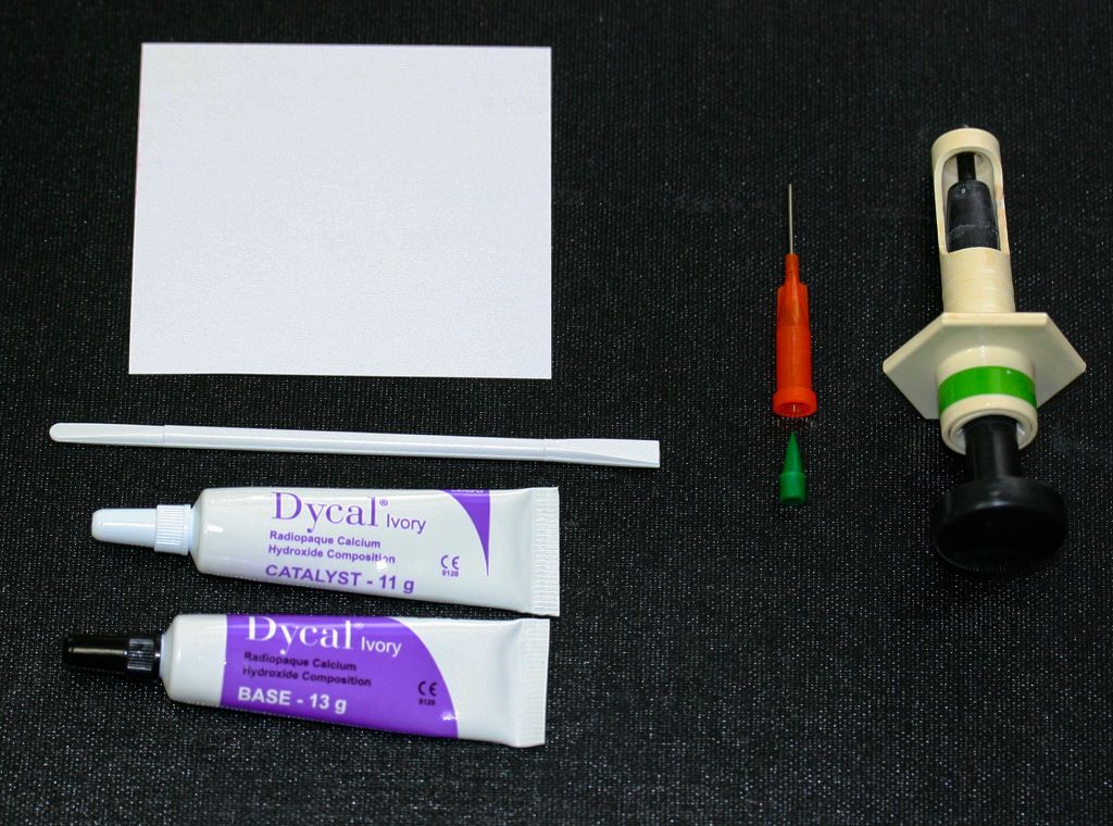 Creative Dycal Use for Aseptic Isolation and Postendodontic