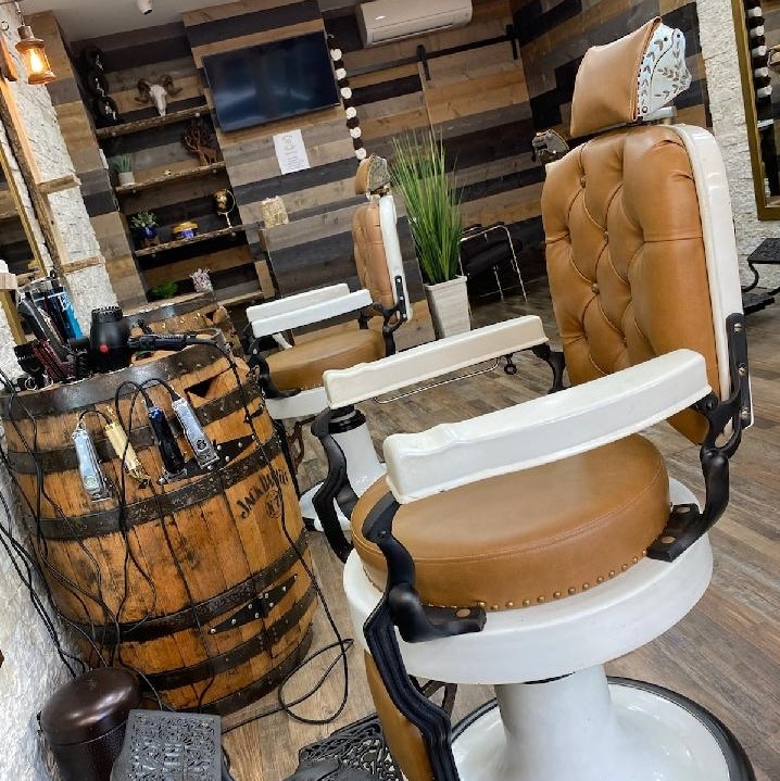 How long does it typically take to get a Mohawk fade haircut at a barbershop?